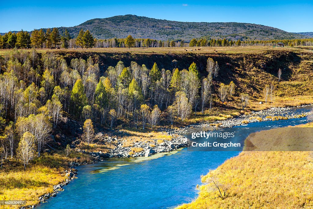A blue river through the mountains
