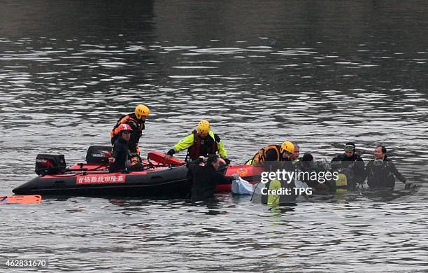 Firefighters keep on searching the missings of TransAsia air crash on 06th February, 2015 in Taipei, Taiwan, China