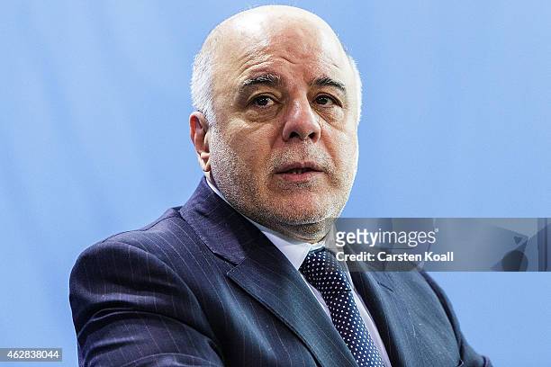 Iraqi Prime Minister Haider Al-Abadi attends a press conference with German Chancellor Angela Merkel at the Chancellery for talks on February 6, 2015...