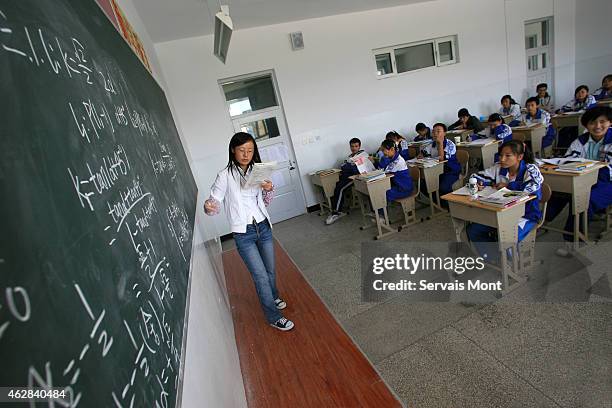 October 13: A teacher teaches Mathematics to Uyghur students in Hetian Experimental Billingual School on October 13, 2006 in Hetian, Xinjiang...