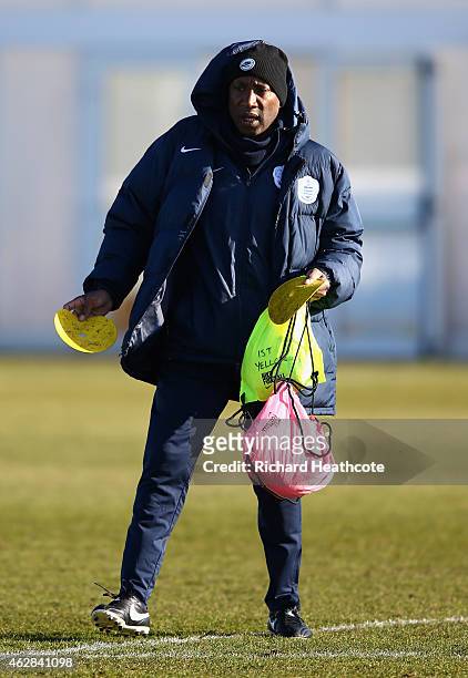 Caretaker manager Chris Ramsey in action during a Queens Park Rangers training session at the Harlington Sports Ground on February 6, 2015 in...