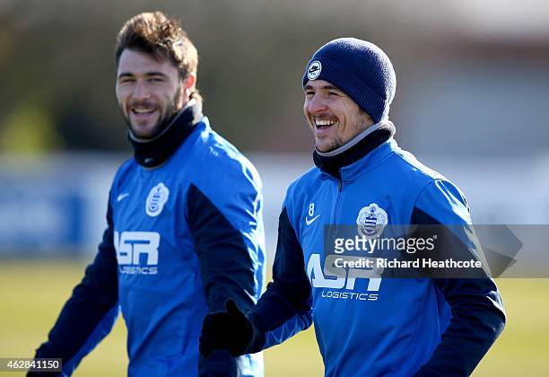 Charlie Austin and Joey Barton in action during a Queens Park Rangers training session at the Harlington Sports Ground on February 6, 2015 in...