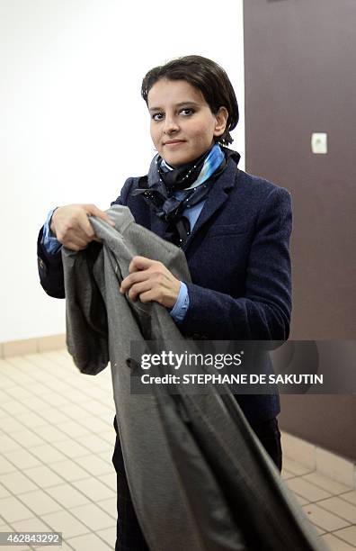 French Education Minister Najat Vallaud-Belkacem leaves after a meeting at the Pierre de Ronsard primary school in Paris on February 6, 2015. AFP...