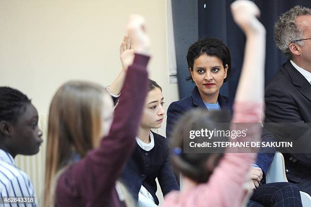 French Education Minister Najat Vallaud-Belkacem attends a meeting at the Pierre de Ronsard primary school in Paris on February 6, 2015. AFP PHOTO /...