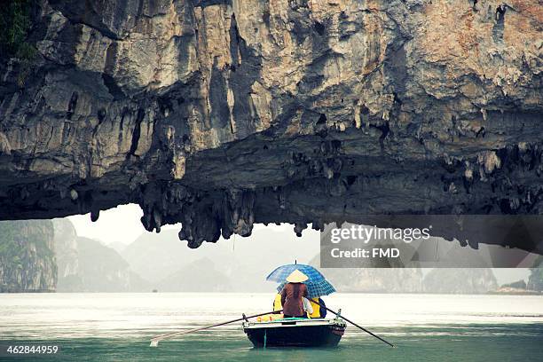 through the rock - halong bay stock pictures, royalty-free photos & images