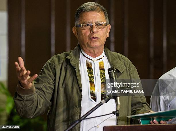 Commander of the FARC-EP leftist guerrillas Rodrigo Granda reads a statement at the Convention Palace in Havana during the peace talks with the...