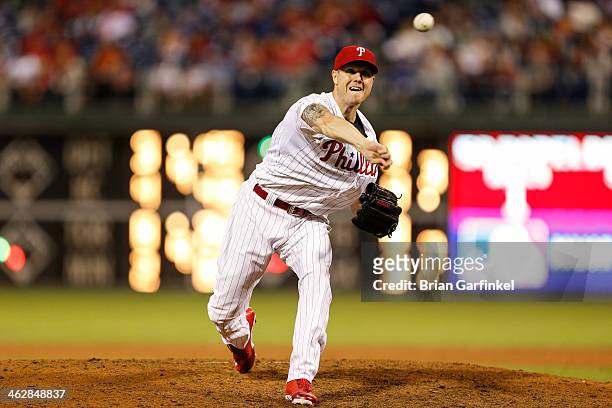 Closer Jonathan Papelbon of the Philadelphia Phillies throws a pitch in the ninth inning of the game against the Atlanta Braves at Citizens Bank Park...