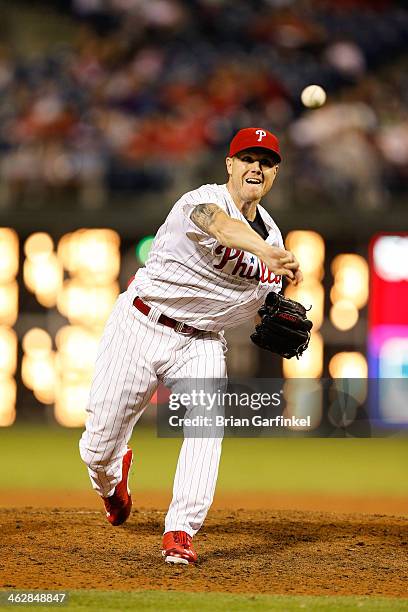 Closer Jonathan Papelbon of the Philadelphia Phillies throws a pitch in the ninth inning of the game against the Atlanta Braves at Citizens Bank Park...