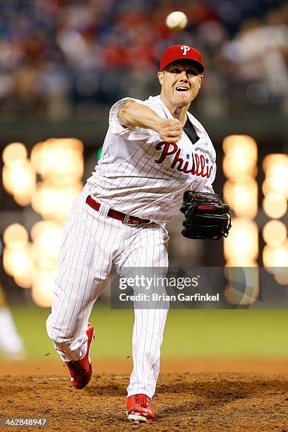 Closer Jonathan Papelbon of the Philadelphia Phillies throws a pitch in the ninth inning of the game against the Atlanta Braves at Citizens Bank Park...