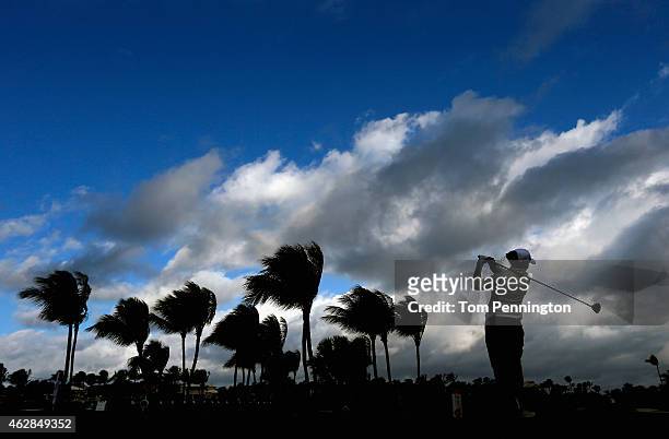 Mo Martin hit a tee shot on the third hole during round one of the Pure Silk Bahamas LPGA Classic at the Ocean Club course on February 6, 2015 in...
