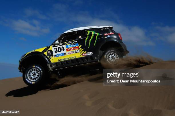 Nani Roma of Spain and Michel Perin of France for MINI and the Monster Energy X-Raid Team compete in stage 10 on the way to Antofagasta during Day 11...