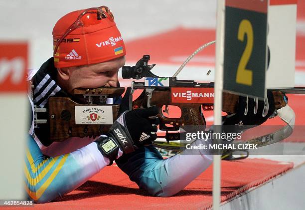 Sergey Semenov of Ukraine competes in the shooting range in the Mixed 2x6 plus 2x7,5 Km Relay competition, part of IBU World Cup Biathlon in Nove...