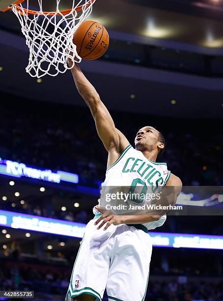 Avery Bradley of the Boston Celtics goes up for a layup against the Toronto Raptors during the game at TD Garden on January 15, 2014 in Boston,...