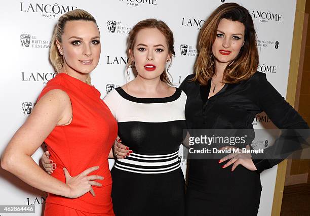 Guest, Tanya Burr and Pixiwoo attend the Lancome Loves Alma Pre-BAFTA party at Cafe Royal on February 6, 2015 in London, England.