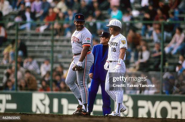 Japan All Star Tour: Detroit Tigers Cecil Fielder with Hanshin Tigers player before game at Hankyu Nishinomiya Stadium. Nishinomiya, Japan 11/7/1990...