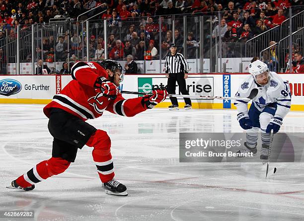 Patrik Elias of the New Jersey Devils scores his 400th career goal at 1:23 of the second period against the Toronto Maple Leafs at the Prudential...