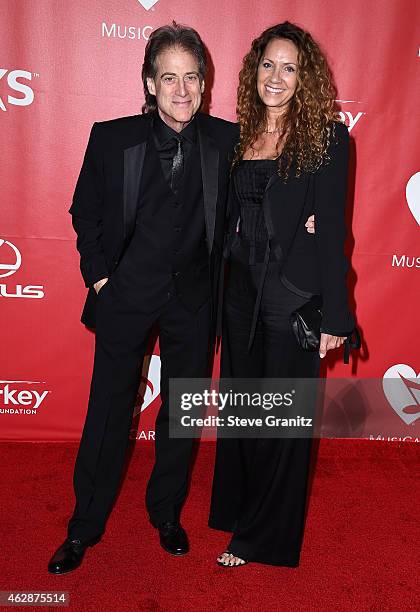 Comedian Richard Lewis and Joyce Lapinsky attend the 25th anniversary MusiCares 2015 Person Of The Year Gala honoring Bob Dylan at the Los Angeles...