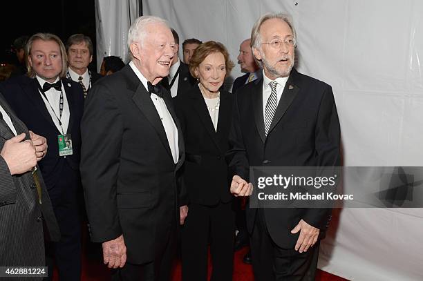 Former President Jimmy Carter, Rosalynn Carter and National Academy of Recording Arts and Sciences President Neil Portnow attend the 25th anniversary...