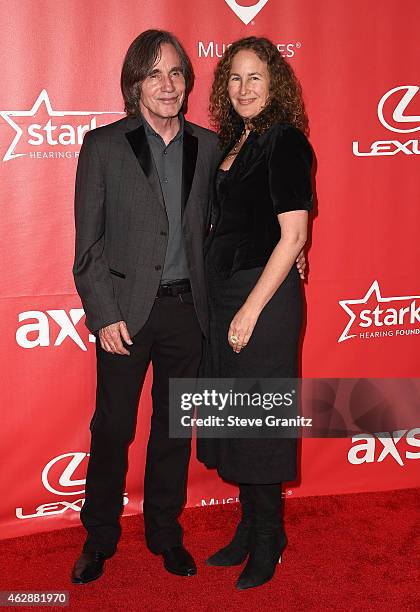 Musician Jackson Browne and Dianna Cohen attend the 25th anniversary MusiCares 2015 Person Of The Year Gala honoring Bob Dylan at the Los Angeles...