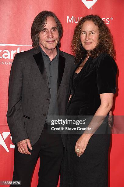 Musician Jackson Browne and Dianna Cohen attend the 25th anniversary MusiCares 2015 Person Of The Year Gala honoring Bob Dylan at the Los Angeles...