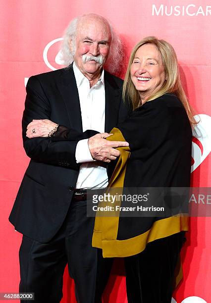Singer David Crosby and Jan Dance attend the 25th anniversary MusiCares 2015 Person Of The Year Gala honoring Bob Dylan at the Los Angeles Convention...