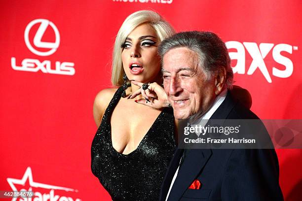 Singers Lady Gaga Tony Bennett attend the 25th anniversary MusiCares 2015 Person Of The Year Gala honoring Bob Dylan at the Los Angeles Convention...