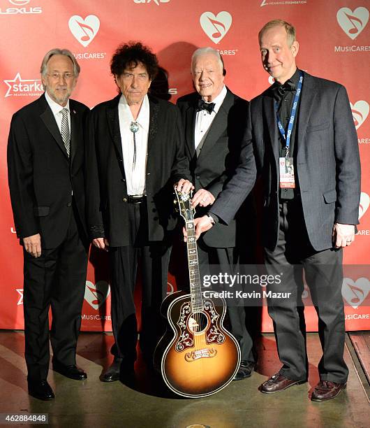 National Academy of Recording Arts and Sciences President Neil Portnow, Bob Dylan, former United States President Jimmy Carter and Chairman of Gibson...