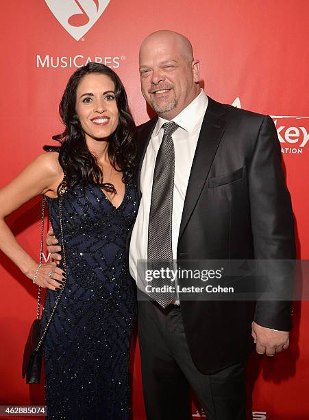 Deanna Burditt and TV personality Rick Harrison attend the 25th anniversary MusiCares 2015 Person Of The Year Gala honoring Bob Dylan at the Los...