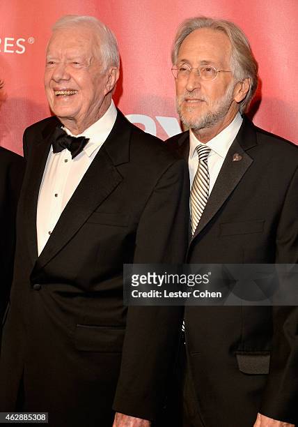 Former U.S. President Jimmy Carter and National Academy of Recording Arts and Sciences President Neil Portnow attend the 25th anniversary MusiCares...