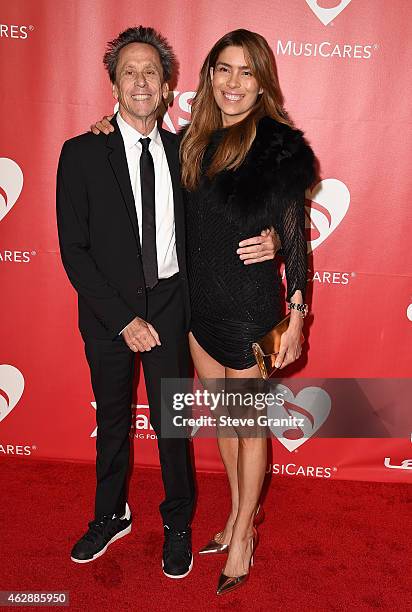 Producer Brian Grazer and Veronica Smiley attend the 25th anniversary MusiCares 2015 Person Of The Year Gala honoring Bob Dylan at the Los Angeles...