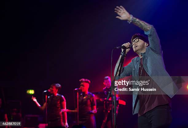 James Arthur performs live on stage at the Hammersmith Apollo on January 15, 2014 in London, England.