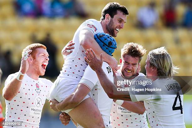 To R, James Rodwell, Charlie Hayter, Richard de Carpentier, Tom Mitchell and Warwick Lahmert of England celebrate Hayter's match-winning try of the...