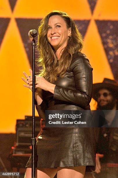 Alanis Morisette performs onstage at the 25th anniversary MusiCares 2015 Person Of The Year Gala honoring Bob Dylan at the Los Angeles Convention...