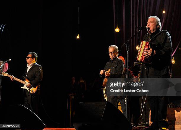 Musicians Cesar Rosas, Louis Perez and David Hidalgo of Los Lobos perform onstage at the 25th anniversary MusiCares 2015 Person Of The Year Gala...