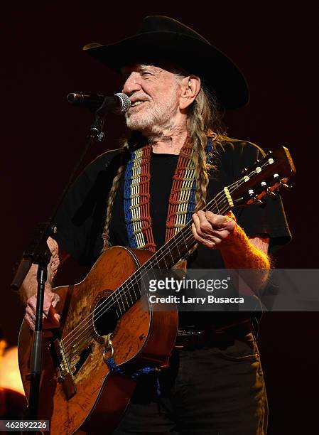 Singer Willie Nelson performs onstage at the 25th anniversary MusiCares 2015 Person Of The Year Gala honoring Bob Dylan at the Los Angeles Convention...