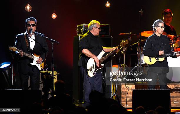 Musicians Cesar Rosas, Conrad Russel Lozano and and Louis Perez of Los Lobos perform onstage at the 25th anniversary MusiCares 2015 Person Of The...