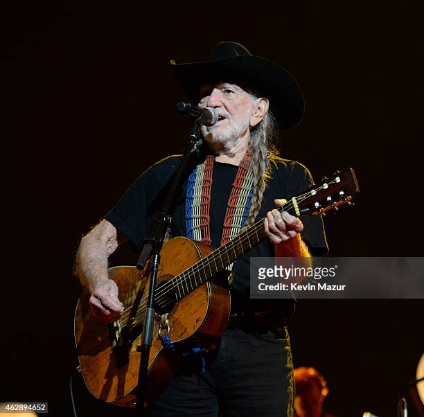 Willie Nelson performs onstage at the 25th anniversary MusiCares 2015 Person Of The Year Gala honoring Bob Dylan at the Los Angeles Convention Center...