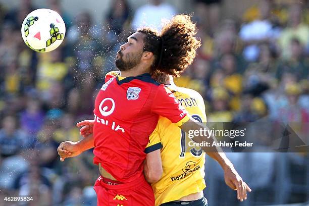 Osama Malick of Adelaide United heads the ball during the round 16 A-League match between the Newcastle Jets and Brisbane Roar at Hunter Stadium on...