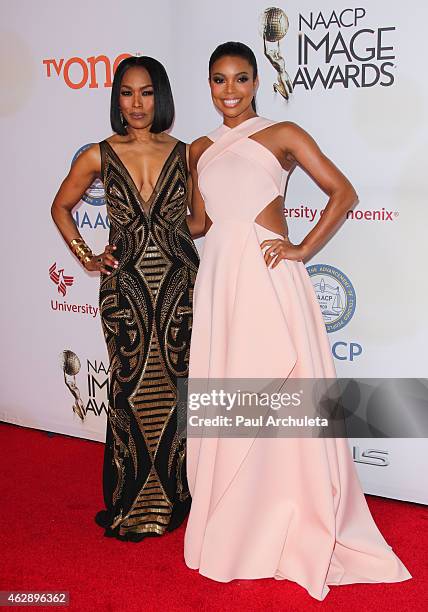 Actress Angela Bassett and Gabrielle Union attend the 46th Annual NAACP Image Awards on February 6, 2015 in Pasadena, California.