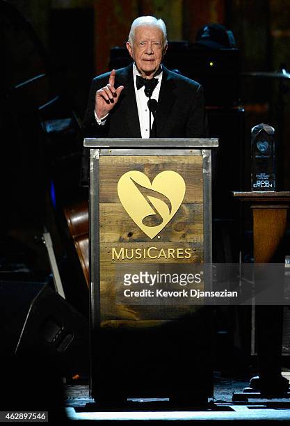 Former President Jimmy Carter speaks onstage at the 25th anniversary MusiCares 2015 Person Of The Year Gala honoring Bob Dylan at the Los Angeles...
