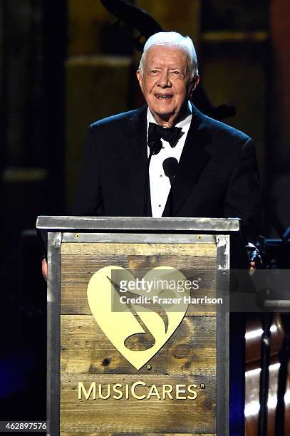 Former U.S. President Jimmy Carter speaks onstage at the 25th anniversary MusiCares 2015 Person Of The Year Gala honoring Bob Dylan at the Los...