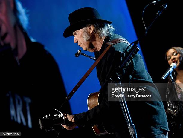 Musician Neil Young performs onstage at the 25th anniversary MusiCares 2015 Person Of The Year Gala honoring Bob Dylan at the Los Angeles Convention...