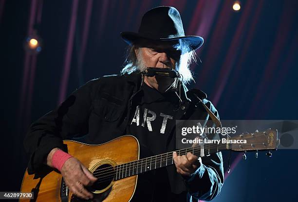 Musician Neil Young performs onstage at the 25th anniversary MusiCares 2015 Person Of The Year Gala honoring Bob Dylan at the Los Angeles Convention...