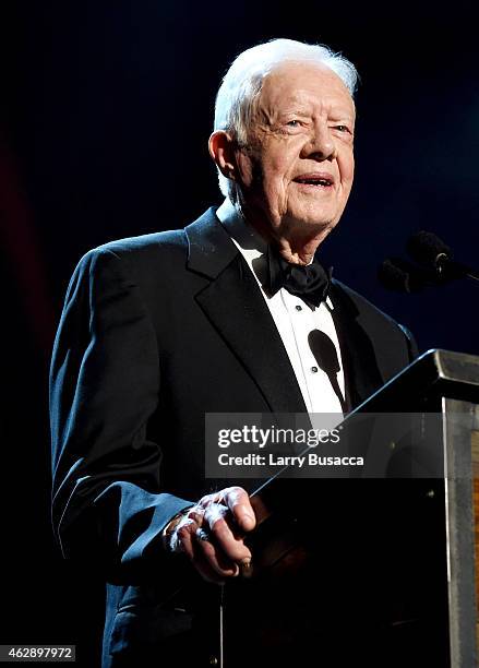 Former President Jimmy Carter speaks onstage at the 25th anniversary MusiCares 2015 Person Of The Year Gala honoring Bob Dylan at the Los Angeles...