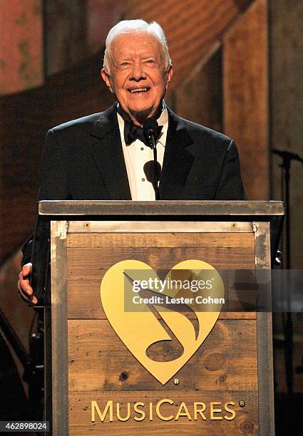 Former President Jimmy Carter speaks onstage at the 25th anniversary MusiCares 2015 Person Of The Year Gala honoring Bob Dylan at the Los Angeles...