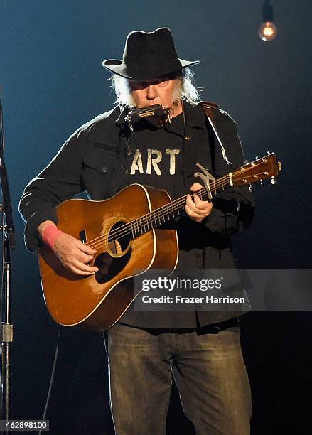 Singer Neil Young performs onstage at the 25th anniversary MusiCares 2015 Person Of The Year Gala honoring Bob Dylan at the Los Angeles Convention...