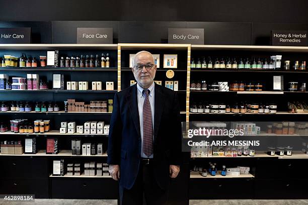 Konstantinos Gardikis, research director of the Apivita ecological cosmetic company poses in front of products in Markopoulo, south of Athens, on...