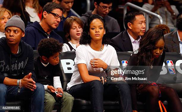 Singer Rihanna attends an NBA game between the Brooklyn Nets and the Miami Heat at Barclays Center on January 10, 2014 in the Brooklyn borough of New...