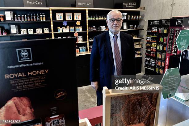 Konstantinos Gardikis, research director of the Apivita ecological cosmetic company poses in front of products in Markopoulo, south of Athens, on...