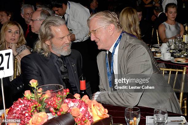 Actor Jeff Bridges and producer/musician T Bone Burnett attend the 25th anniversary MusiCares 2015 Person Of The Year Gala honoring Bob Dylan at the...